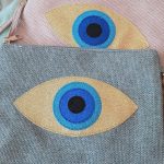 Blue evil eye clutch
