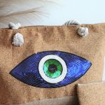 Blue evil eye tote bag
