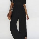 Μονόχρωμη jumpsuit με V μαύρη