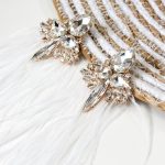 Σκουλαρίκια με φτερά σε λευκό