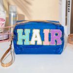 Διάφανο νεσεσέρ με γούνινα γράμματα μπλε