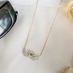 Χρυσό κολιέ ατσάλινο με κύκνους