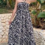 Φόρεμα ασπρόμαυρο με διακοσμητικό λουλούδι