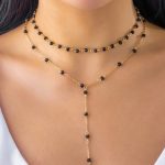 Διπλό κολιέ με μαύρες χάντρες σε χρυσό