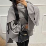 Ασύμμετρη γκρί κάπα