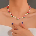 Κολιέ με καρπουζάκια και χάντρες