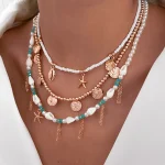 Κολιέ layered με κοχύλια και χρυσά charms