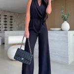 Ολόσωμη μαύρη φόρμα ριγέ με ζώνη